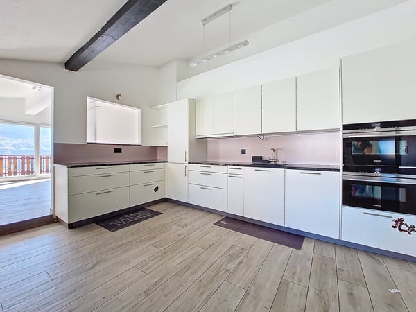 Flanthey – Charmante villa 1.5 pièces avec terrasse, pelouse et garage double 18