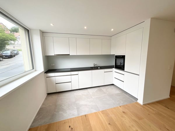 Appartements neufs de 2.5 pièces avec loggia - Confort moderne, durabilité et qualité de vie au coeur du village 1
