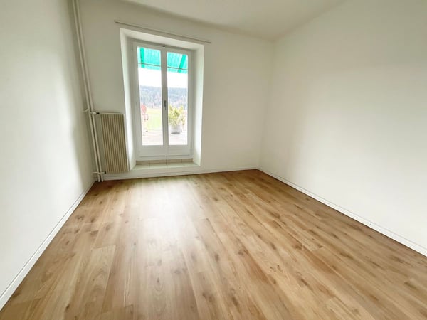 Charmant appartement de 4 pièces avec grande terrasse au coeur de Tramelan 8