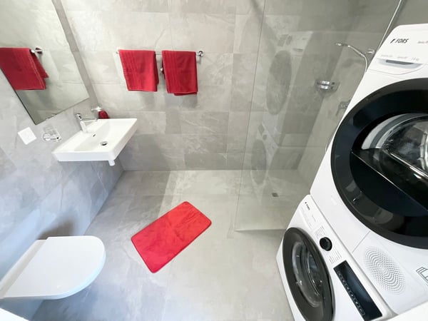 Appartements neufs de 3.5 pièces avec loggia - Immeuble moderne et écologique au coeur du village 12
