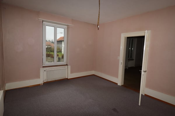 Mietshaus mit Wohn- und Gewerbebereich 9