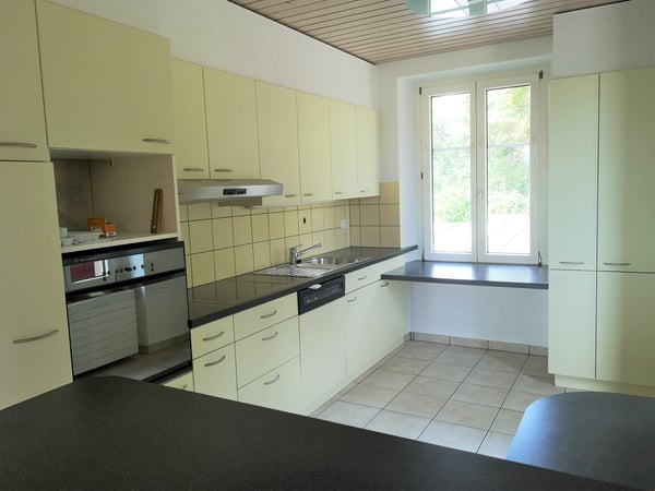 Immeuble complètement loué de 3 appartements avec réserve de terrain à bâtir 9