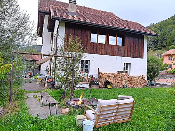 Maison multifonctionnelle avec 3 appartements, carnotzet et jardin 7