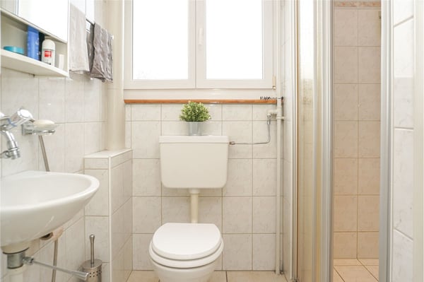 Vielseitiges Dreiparteienhaus mit Garten und attraktiven Nutzungsmöglichkeiten 7