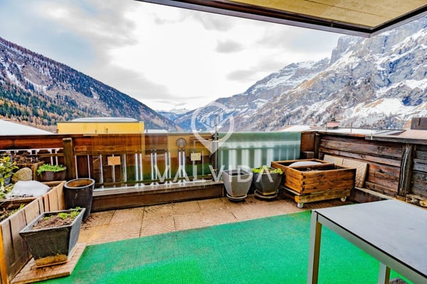 1-Zimmer-Eigentumswohnung mit Alpenpanorama, Tiefgaragenplatz und Keller 8