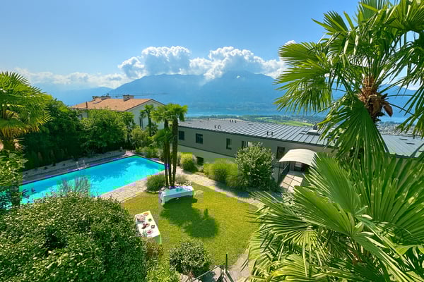 8 A - 1.5 con giardino e piscina condominiale - Residenza Lumino Locarno Monti 1