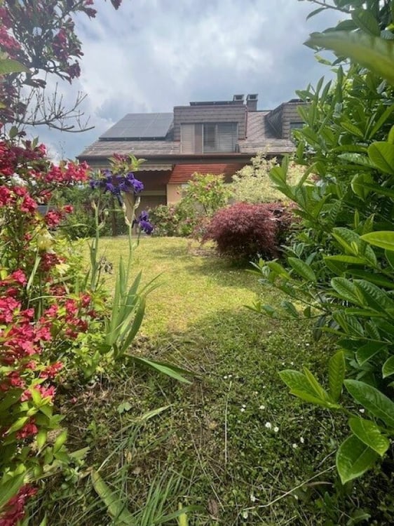 Maison mitoyenne avec jardin 1