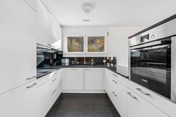 Moderne Attika Wohnung mit Aussicht ins Grüne 3
