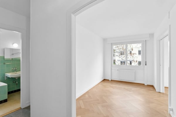 Dans un immeuble idéalement situé, proche de toutes commodités. 7