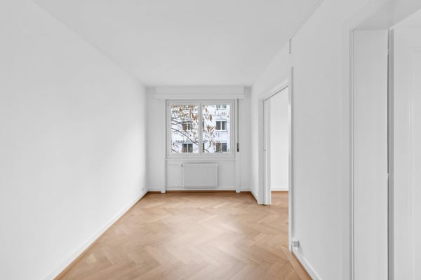 Dans un immeuble idéalement situé, proche de toutes commodités. 9