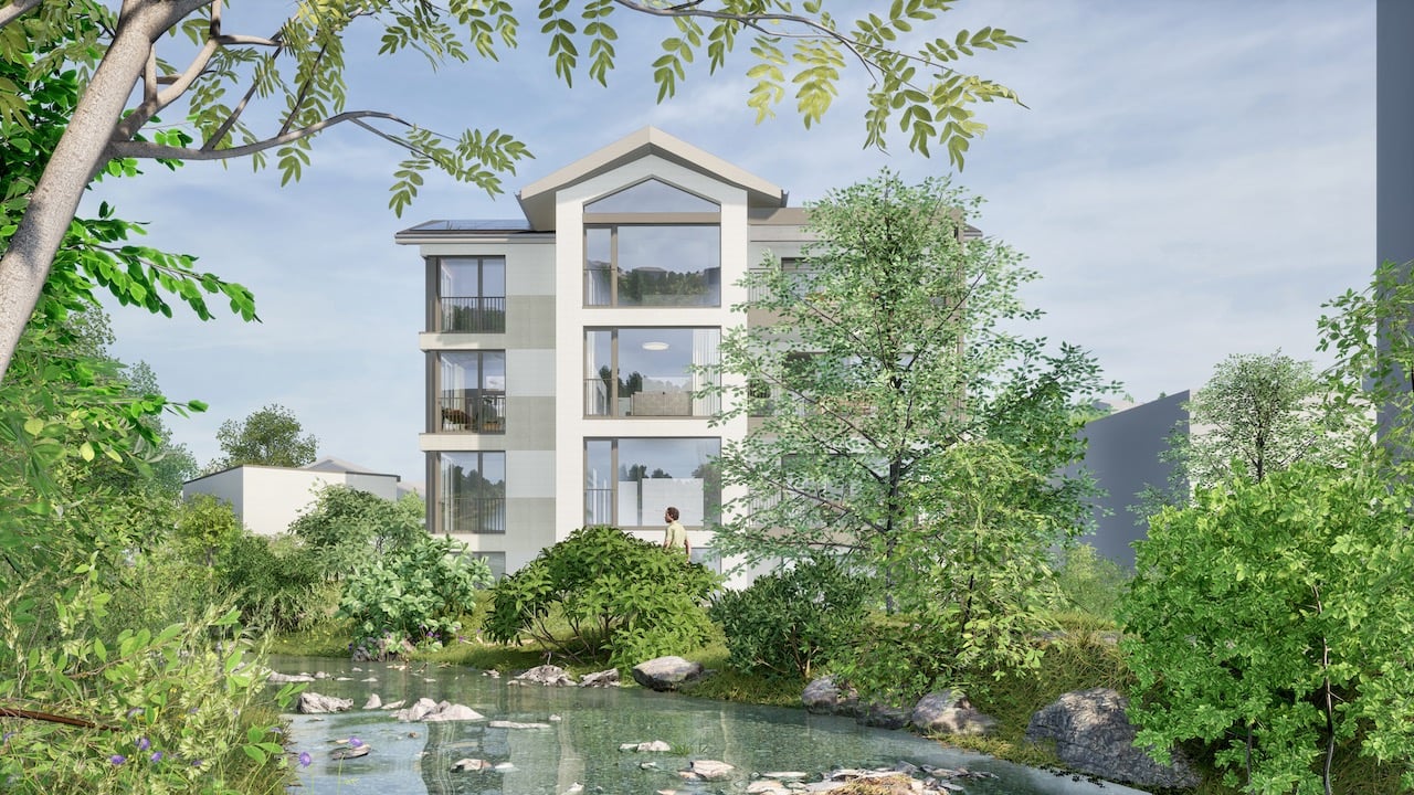Modern apartment building, white exterior, solar panels on roof, large glass windows, multiple balconies, surrounded by greenery and a stream