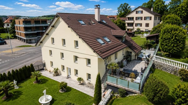 Propriété de caractère composée de 3 appartements – 393 m² habitables à Romont 1
