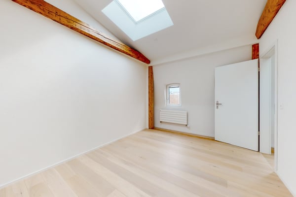 Appartement entièrement rénové avec poutres apparentes 3