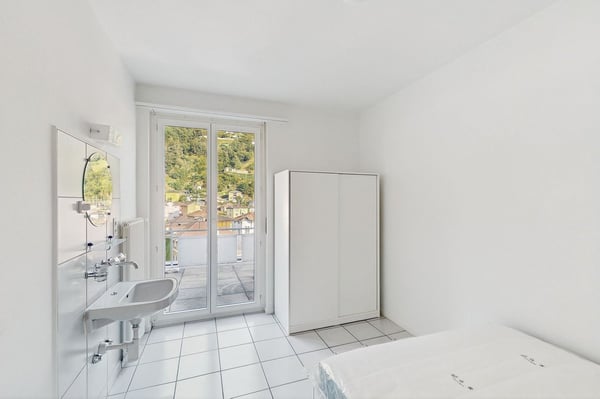 Camere singole in locazione allultimo piano  posizione strategica 2