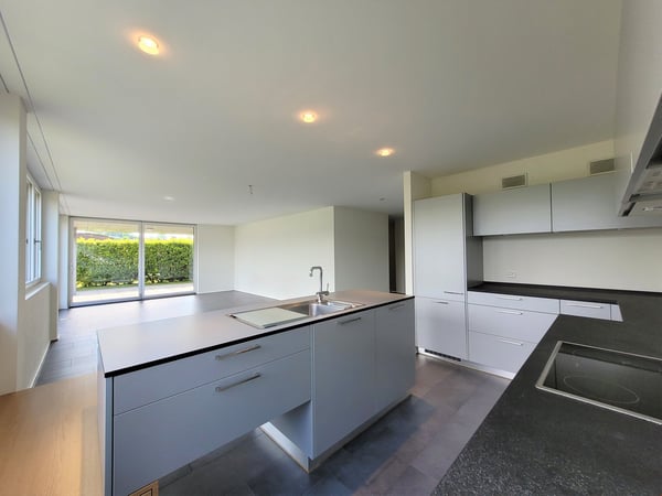 4,5 Zimmer-Wohnung im EG mit Gartensitzplatz