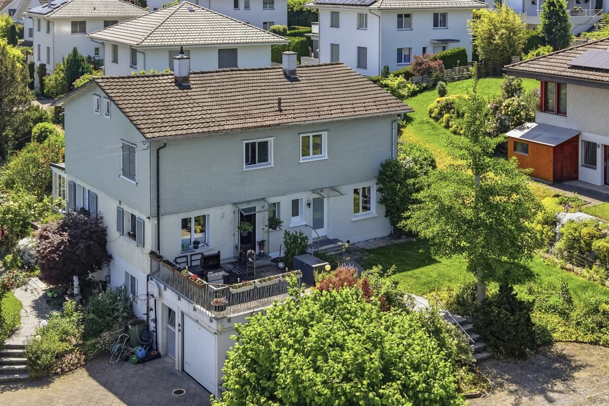 Charmantes Doppel-Einfamilienhaus mit Wintergarten und Garage an traumhafter Lage