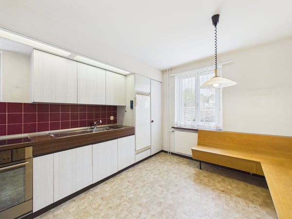Charmantes Doppeleinfamilienhaus mit Garten | Zentrumsnah und voller Potenzial 4