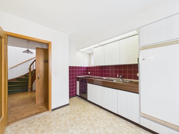 Charmantes Doppeleinfamilienhaus mit Garten | Zentrumsnah und voller Potenzial 5