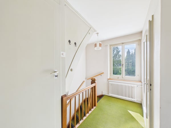 Charmantes Doppeleinfamilienhaus mit Garten | Zentrumsnah und voller Potenzial 8