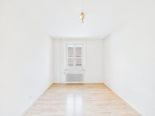 Charmantes Doppeleinfamilienhaus mit Garten | Zentrumsnah und voller Potenzial 9