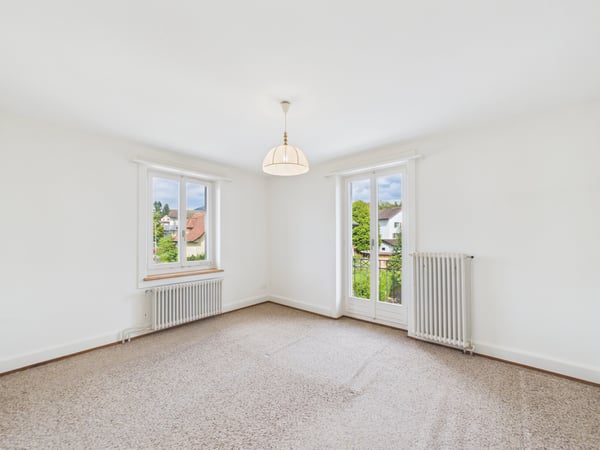 Charmantes Doppeleinfamilienhaus mit Garten | Zentrumsnah und voller Potenzial 10