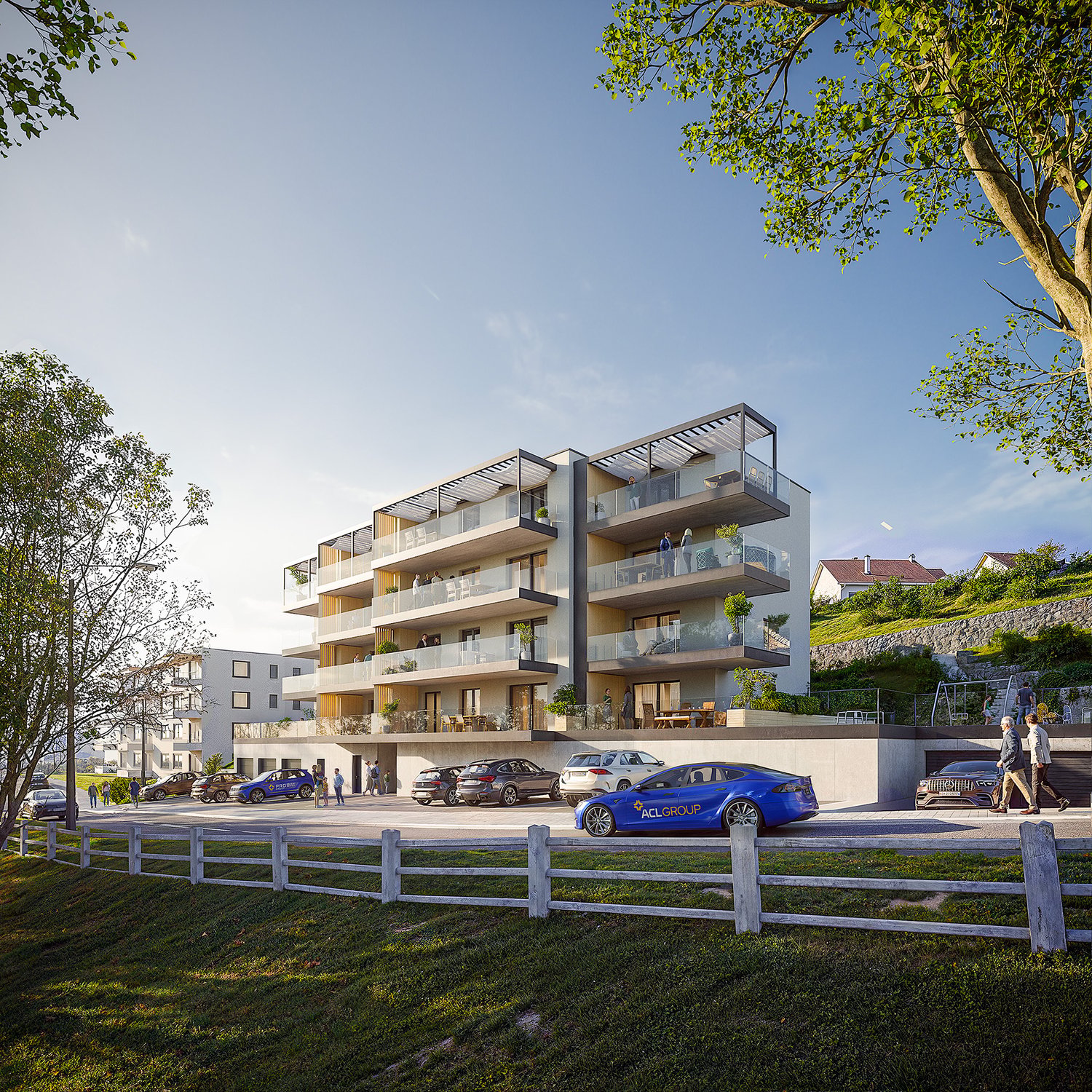 Modern apartment building with multiple balconies, glass railings, and a ground floor entrance.