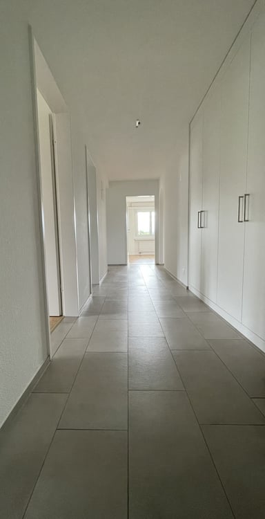 Charmante 4-Zimmerwohnung mit Sitzplatz und Waschturm 5