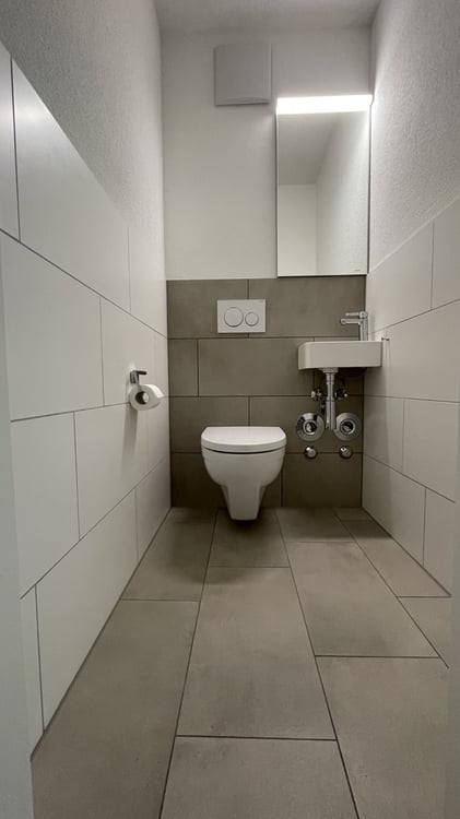 Charmante 4-Zimmerwohnung mit Sitzplatz und Waschturm 3