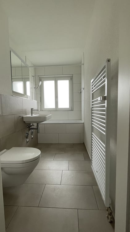 Charmante 4-Zimmerwohnung mit Sitzplatz und Waschturm 2