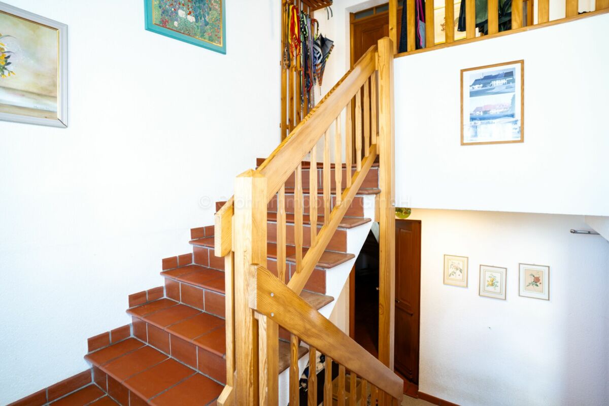 Casa bifamiliare con terreno edificabile - Un'opportunità unica