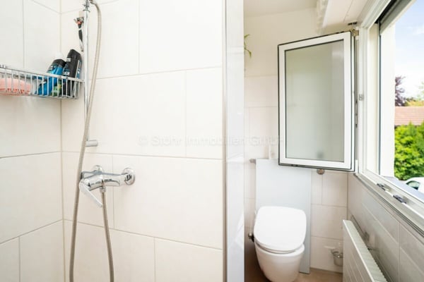 5.5-Zimmerwohnung im Hochparterre mit Balkon und vielseitigen Nebenräumen 12