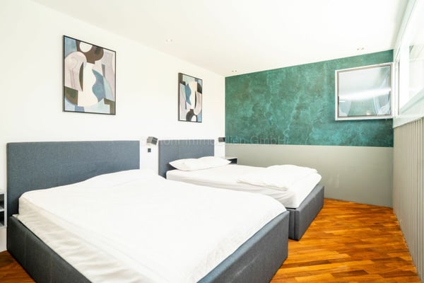 Elegante 10-Zimmer Villa mit aussergewöhnlicher Architektur 31