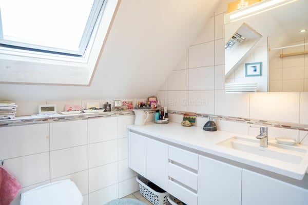 Charmantes Dreifamilienhaus mit Garten in Winterthur-Veltheim 11