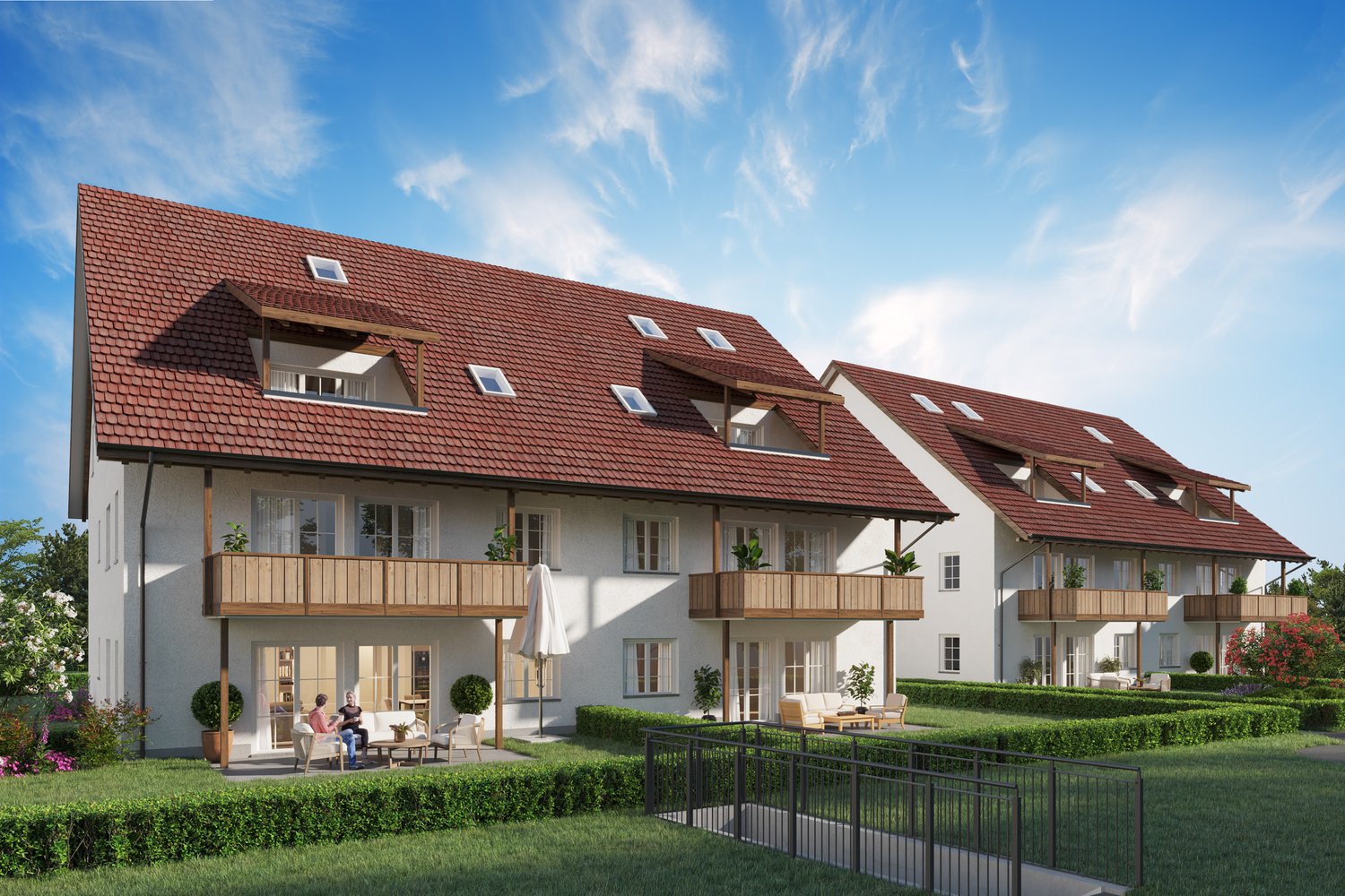 Triplex apartment buildings, red roof, white walls, balconies with wooden railings, garden with hedges, walkway