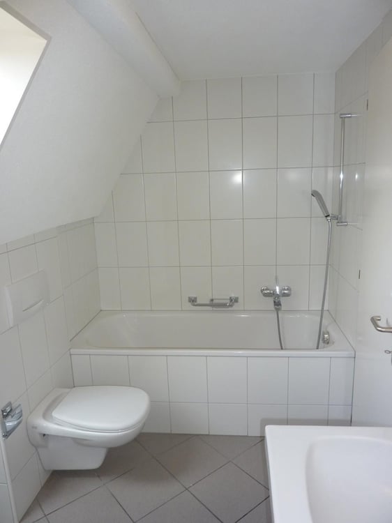 Charmante und helle Dachwohnung mit Holzbalken 3