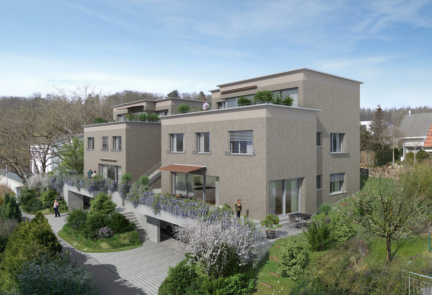 3-story apartment building with gray exterior, large windows, balconies, and a landscaped garden area with trees and shrubs in the foreground