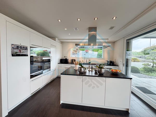 Luxuriöses Terrassenhaus am Sonnenhang mit unverbaubarem Alpenpanorama 4