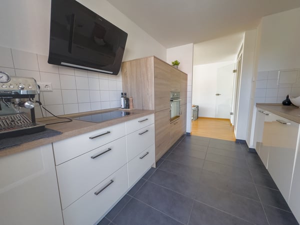 Helle neuwertige 1.5 Zimmer-Wohnung mit Terrasse, Lift und Tiefgarage 13