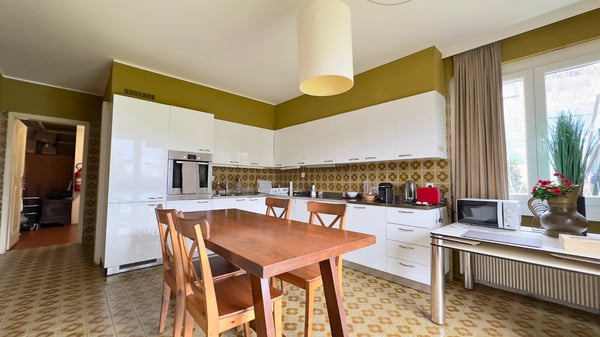 Gentilino, ampia casa bifamiliare con due appartamenti separati e giardino privato. 13