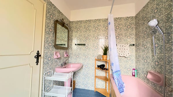 Gentilino, ampia casa bifamiliare con due appartamenti separati e giardino privato. 15