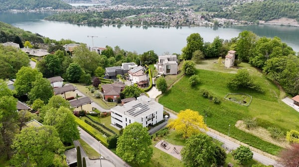 Montagnola – Arasio: elegante 1.5 locali con giardino privato e terrazza panoramica 1