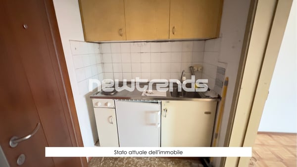 Mendrisio: palazzina a reddito con magazzino, 13 box e 5 posteggi este 12