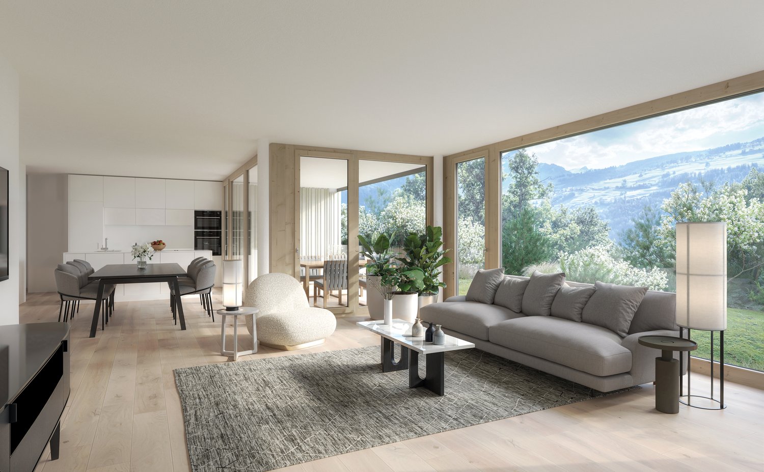 large glass windows, gray sectional sofa, coffee table, potted plants, hardwood floors, kitchen with island and dining table