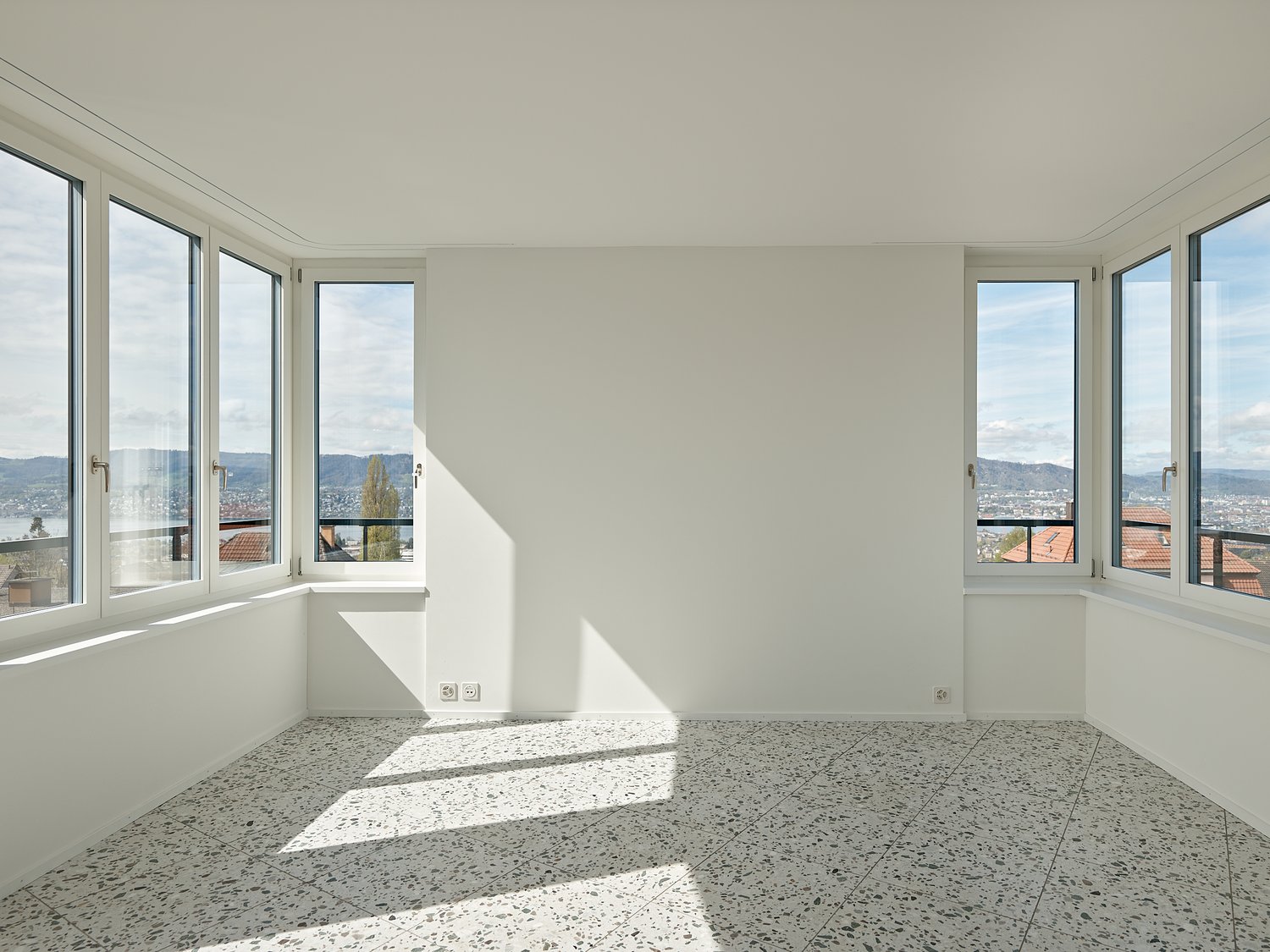 large windows, marble flooring, spacious, bright