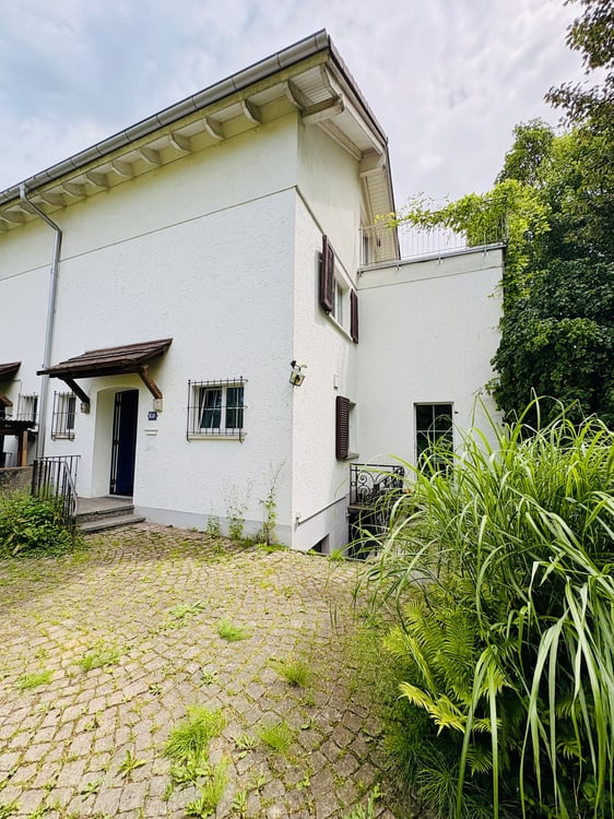 Charmantes 5.5-Zimmer-Zweifamilienhaus mit Garten im beliebten Triemliquartier 1