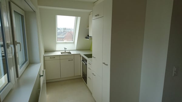Helle Dachmaisonette mit Dachterrasse und Alpenblick 7