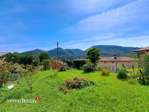 Bauland an schöner & ruhiger Lage mit Weitsicht in Monteggio mit Projekt zum top Preis 1