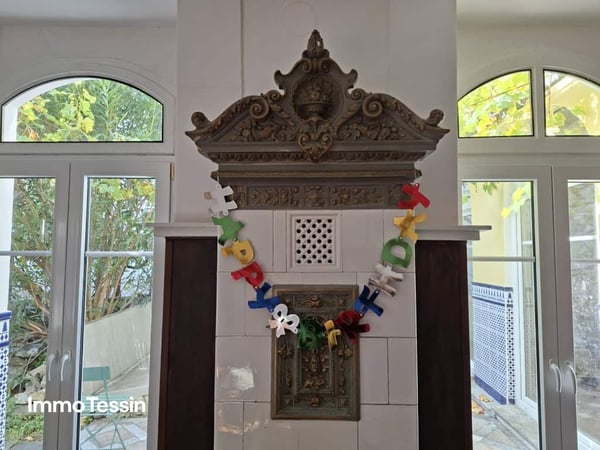 RENDITEOBJEKT: Elegante & sanierte Jugendstilvilla mit 6 Wohnungen und Garten an zentraler top Lage in Muralto 11