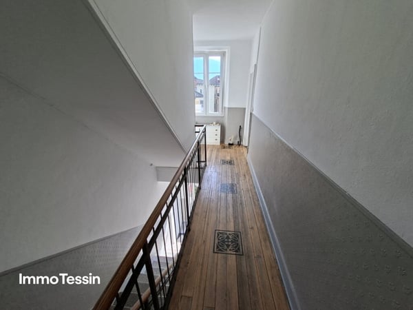 RENDITEOBJEKT: Elegante & sanierte Jugendstilvilla mit 6 Wohnungen und Garten an zentraler top Lage in Muralto 12