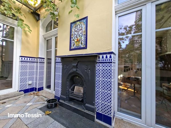 RENDITEOBJEKT: Elegante & sanierte Jugendstilvilla mit 6 Wohnungen und Garten an zentraler top Lage in Muralto 5